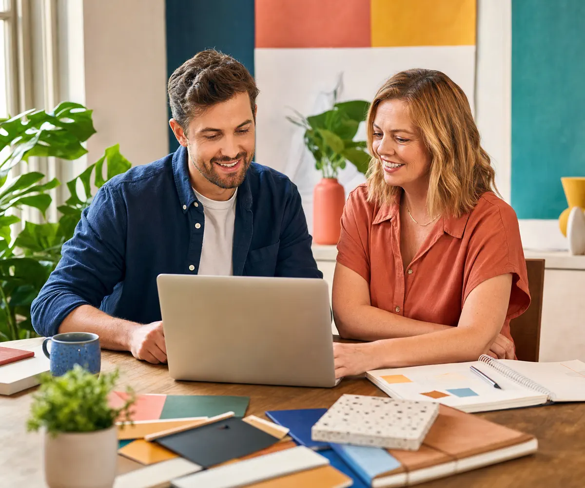 A business owner and web consultant reviewing a website plan together